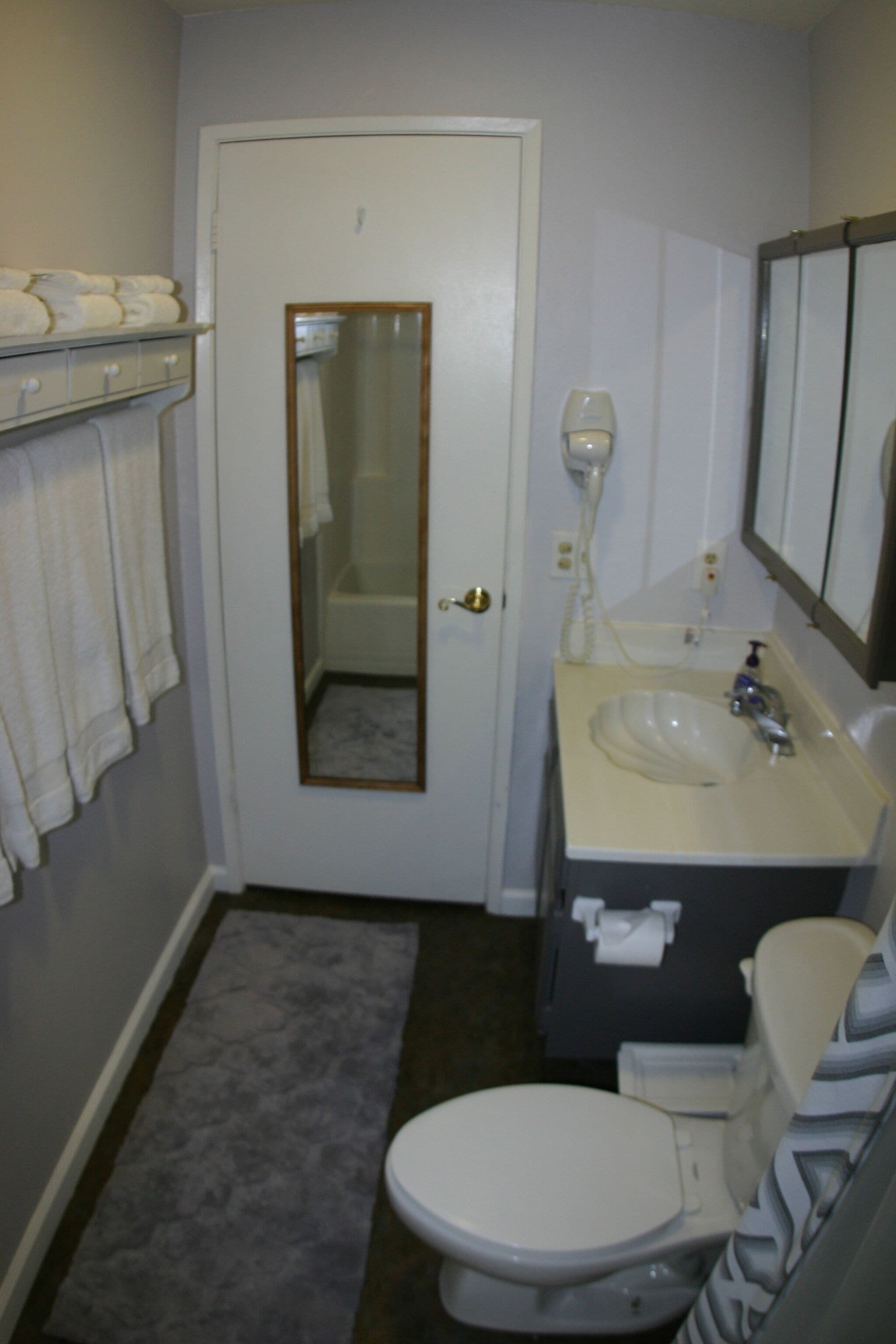 Combined shower/tub, hair dryer, towels, soap