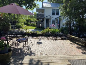 Outdoor dining - Beautifully renovated Carriage House apt within a tree-house like setting.  (Burlington)