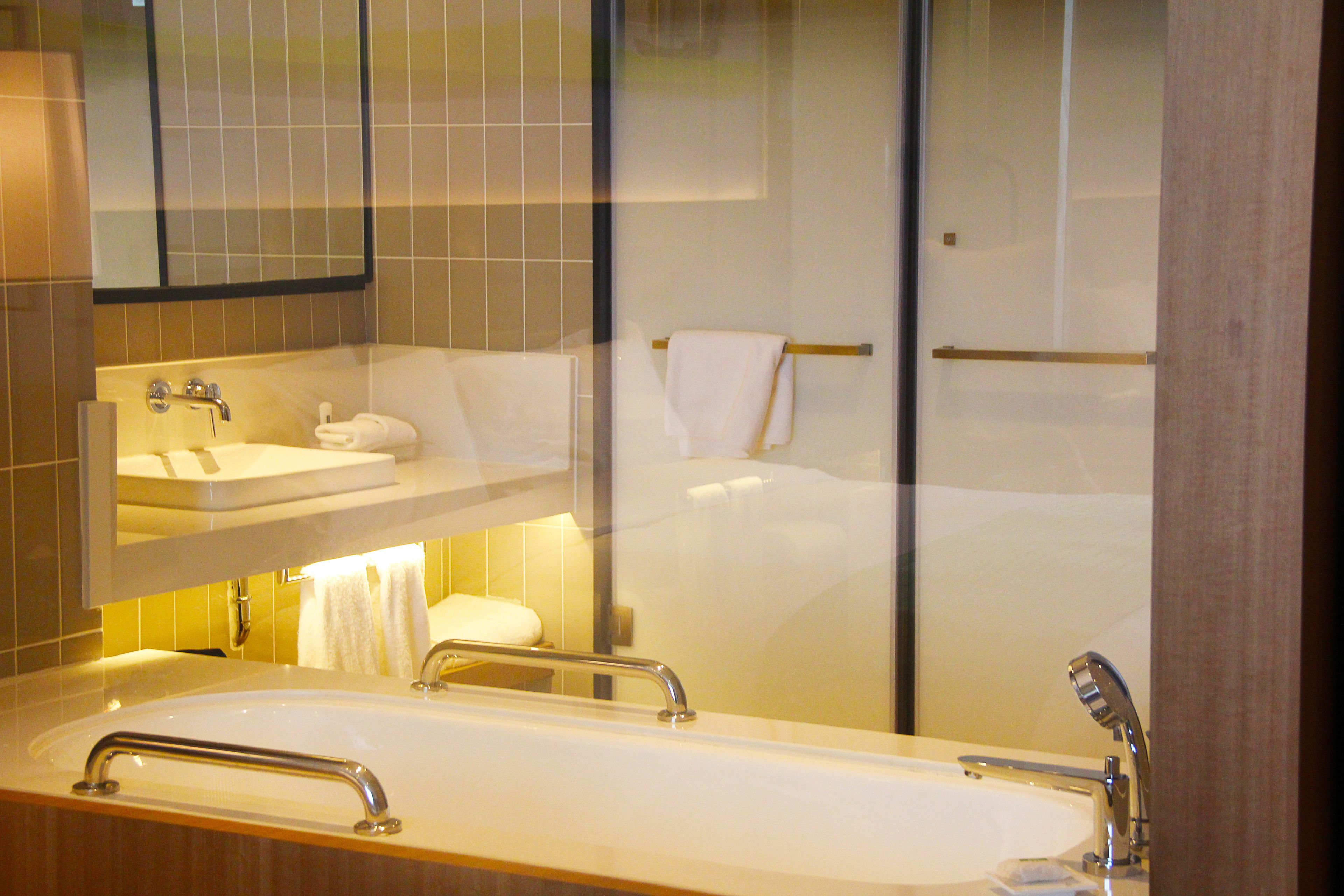 suite, 1 bedroom, city view | bathroom | hair dryer, bathrobes, slippers, towels