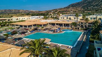 2 outdoor pools, open 8:00 AM to 7:00 PM, pool umbrellas, sun loungers