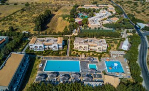 2 outdoor pools, open 8:00 AM to 7:00 PM, pool umbrellas, pool loungers