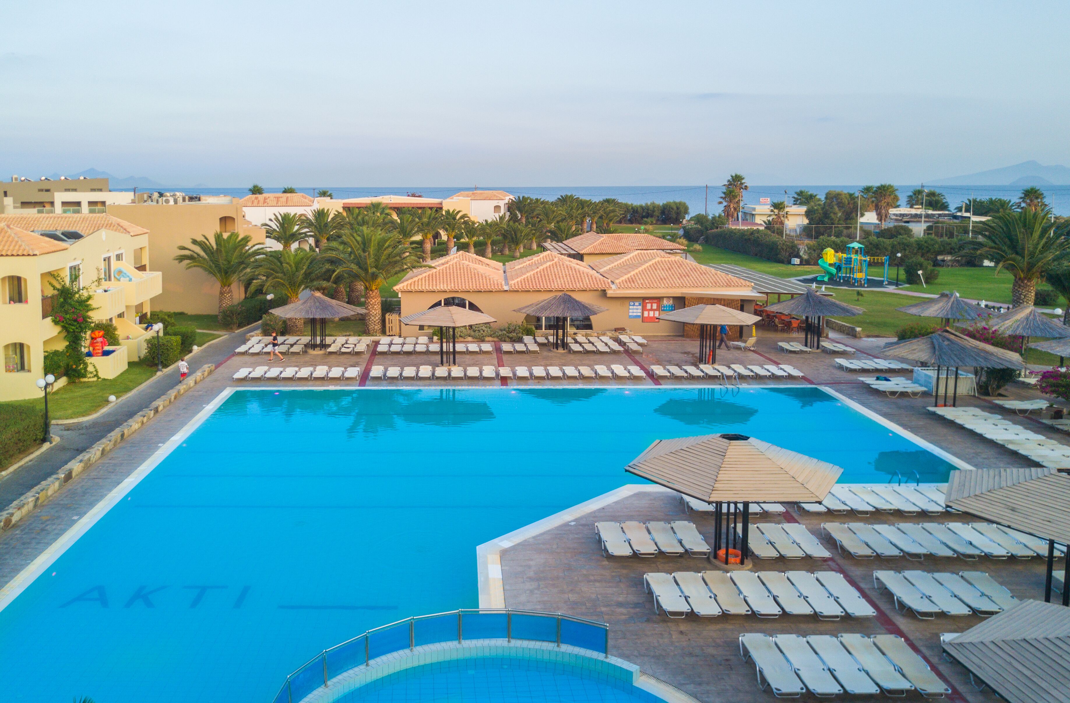 2 outdoor pools, open 8:00 AM to 7:00 PM, pool umbrellas, sun loungers