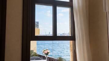 Deluxe Room, Balcony | Minibar, desk, soundproofing, iron/ironing board