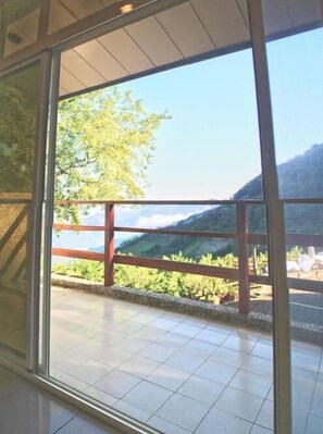 Quarto quádruplo conforto, 2 camas de casal, no jardim | Sacada