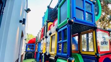A multi-level play structure with various slides and climbing elements.