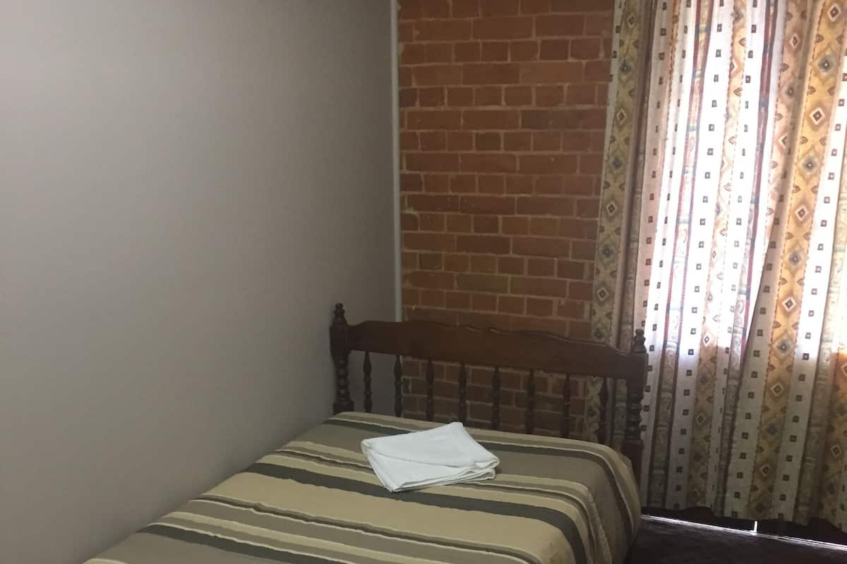 Eenpersoonskamer, balkon | Een bureau, gratis wifi, beddengoed