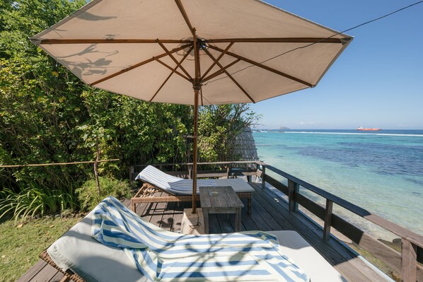 Deluxe Cottage, 2 Bedrooms, Beachfront | Terrace/patio