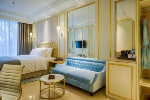 Habitación Premier | Zona de estar | Una televisión LCD