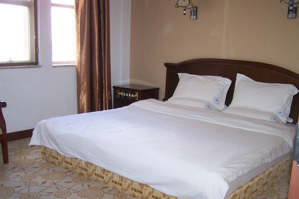 Premium bedding, iron/ironing board (on request), cribs (free)