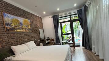 Deluxe Double Room, 1 King Bed, Garden View | Minibar, desk, blackout curtains, soundproofing