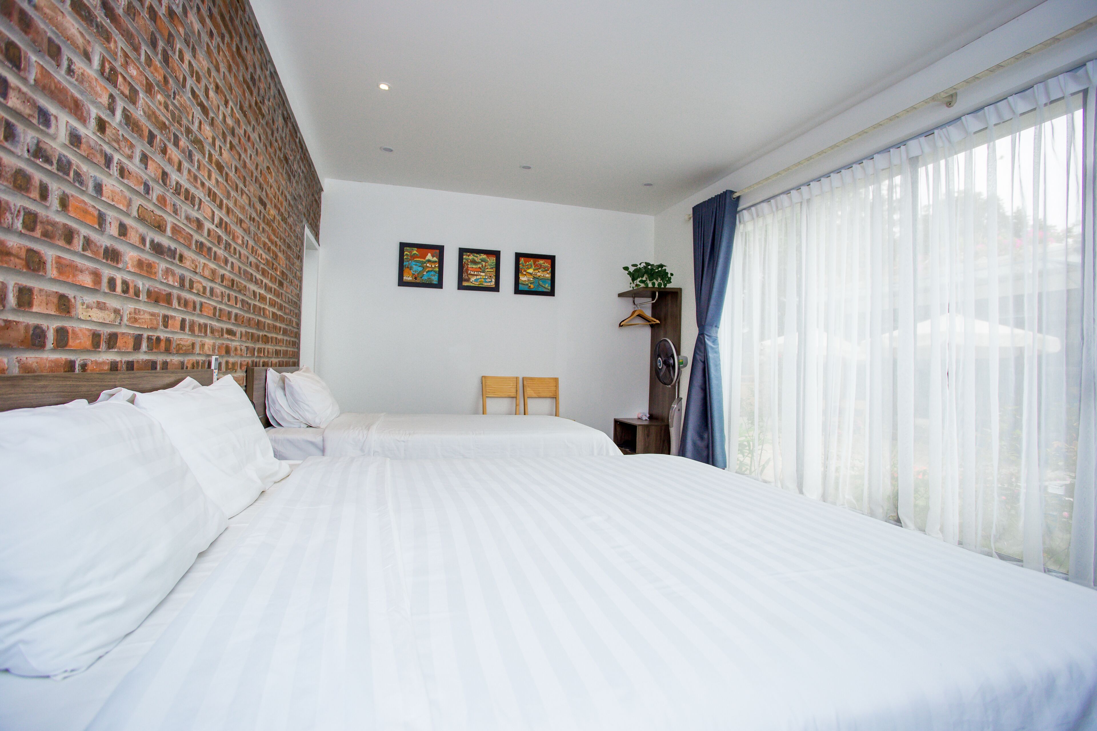 family room, garden view | minibar, desk, blackout curtains, soundproofing