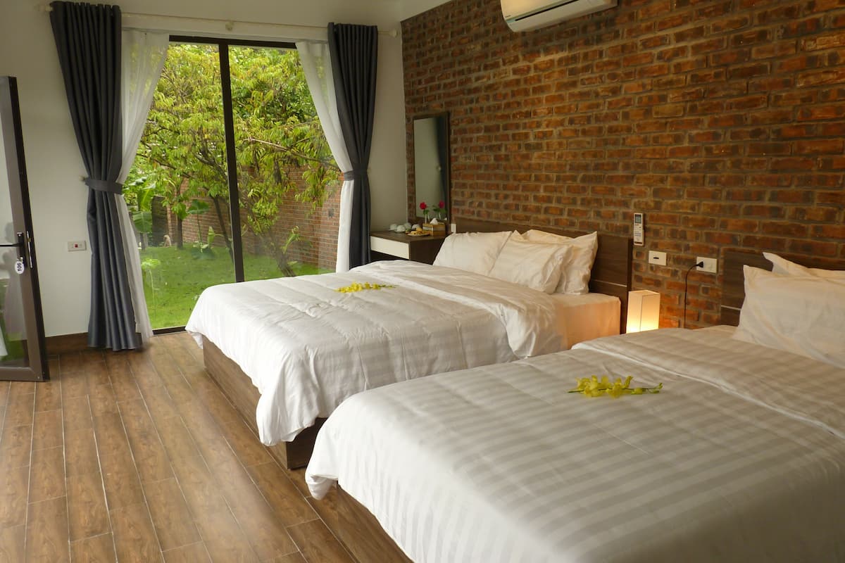 family room, garden view | minibar, desk, blackout curtains, soundproofing