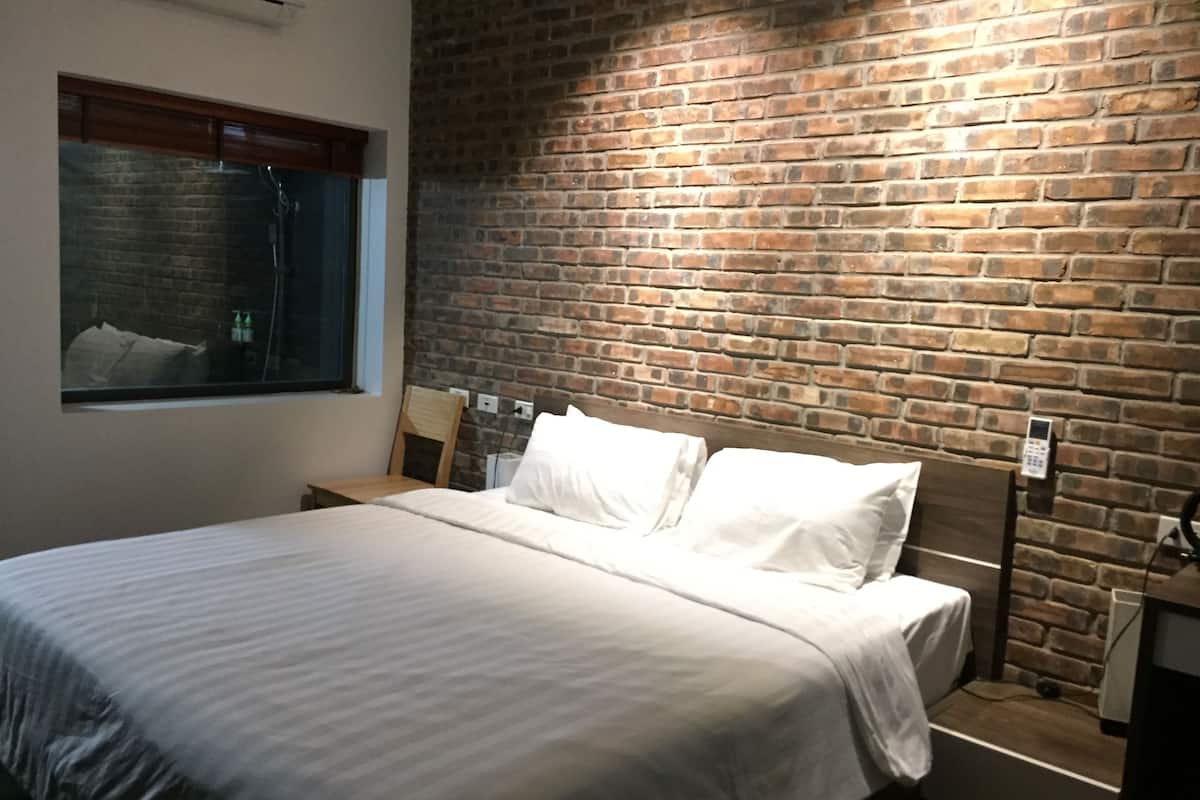 deluxe double room, 1 king bed, garden view | minibar, desk, blackout curtains, soundproofing