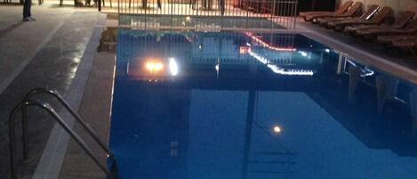 Outdoor pool, pool umbrellas, sun loungers