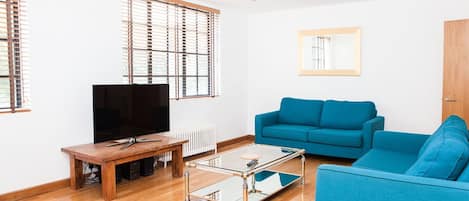 Apartment, 4 Bedrooms | Living area