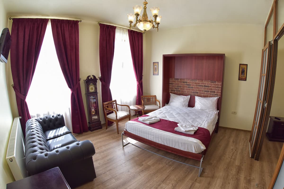 Deluxe Apartment, Multiple Beds, City View | 1 bedroom, premium bedding, in-room safe, desk