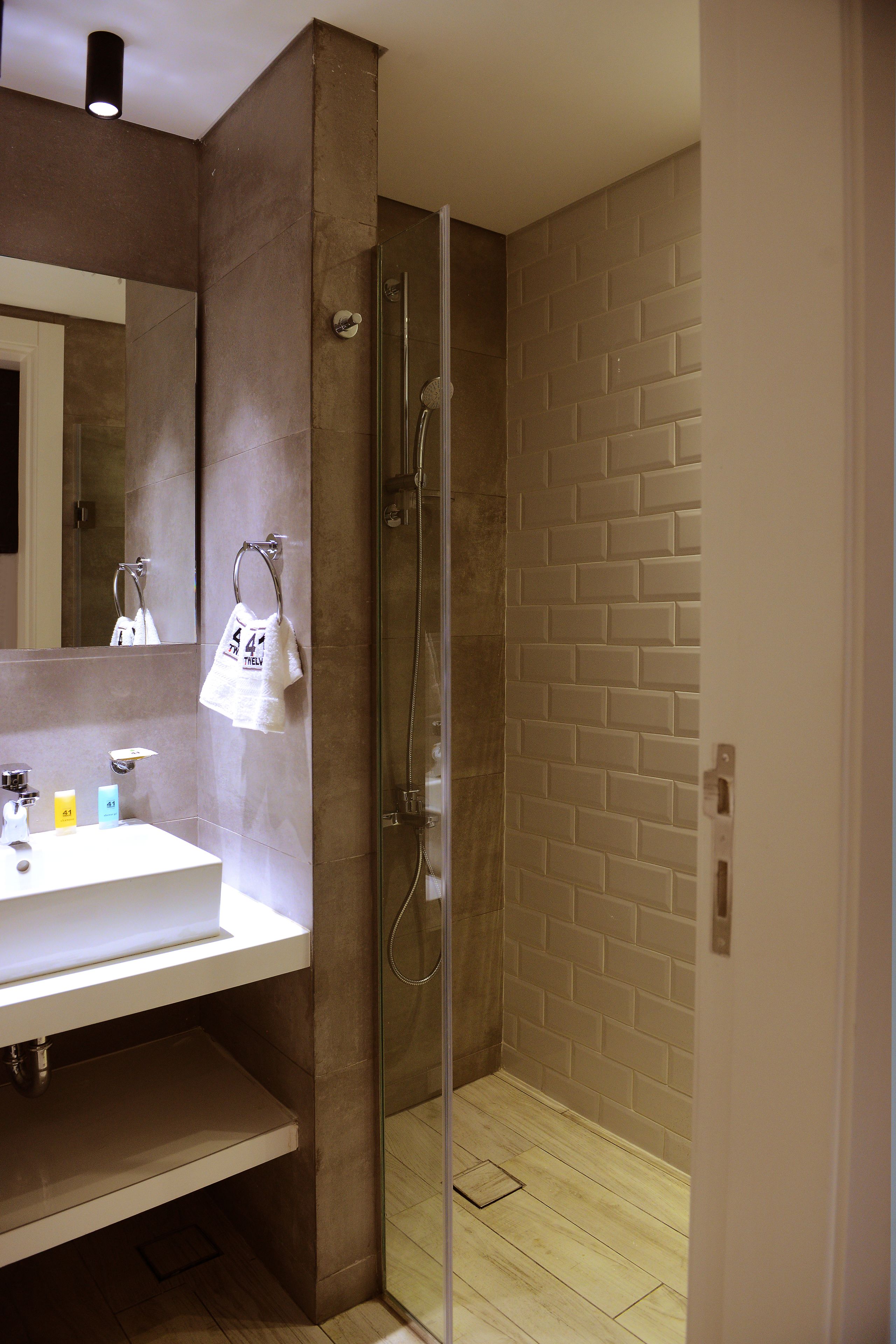 Family Suite, 1 Bedroom, Kitchenette | Bathroom | Rainfall showerhead, eco-friendly toiletries, hair dryer, towels