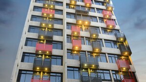 A high-rise building with multiple balconies, large windows, and a modern architectural design. - 41 Twelve (Beirut)