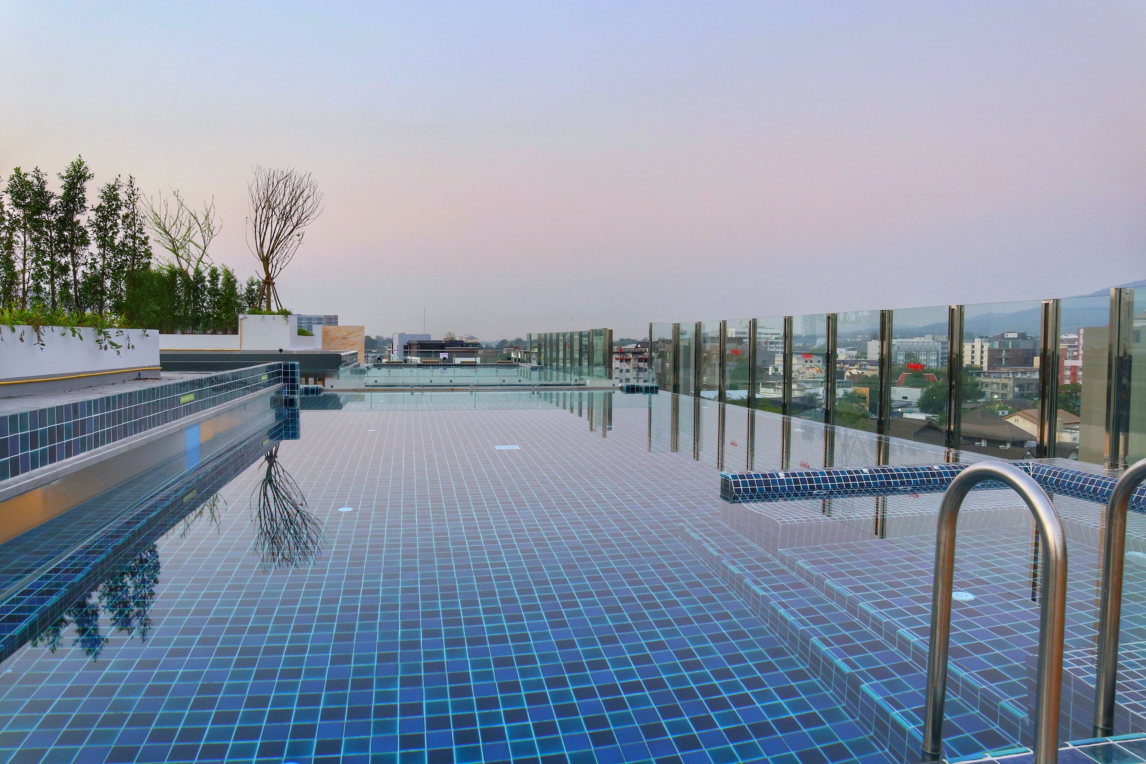 2 outdoor pools, pool umbrellas, pool loungers