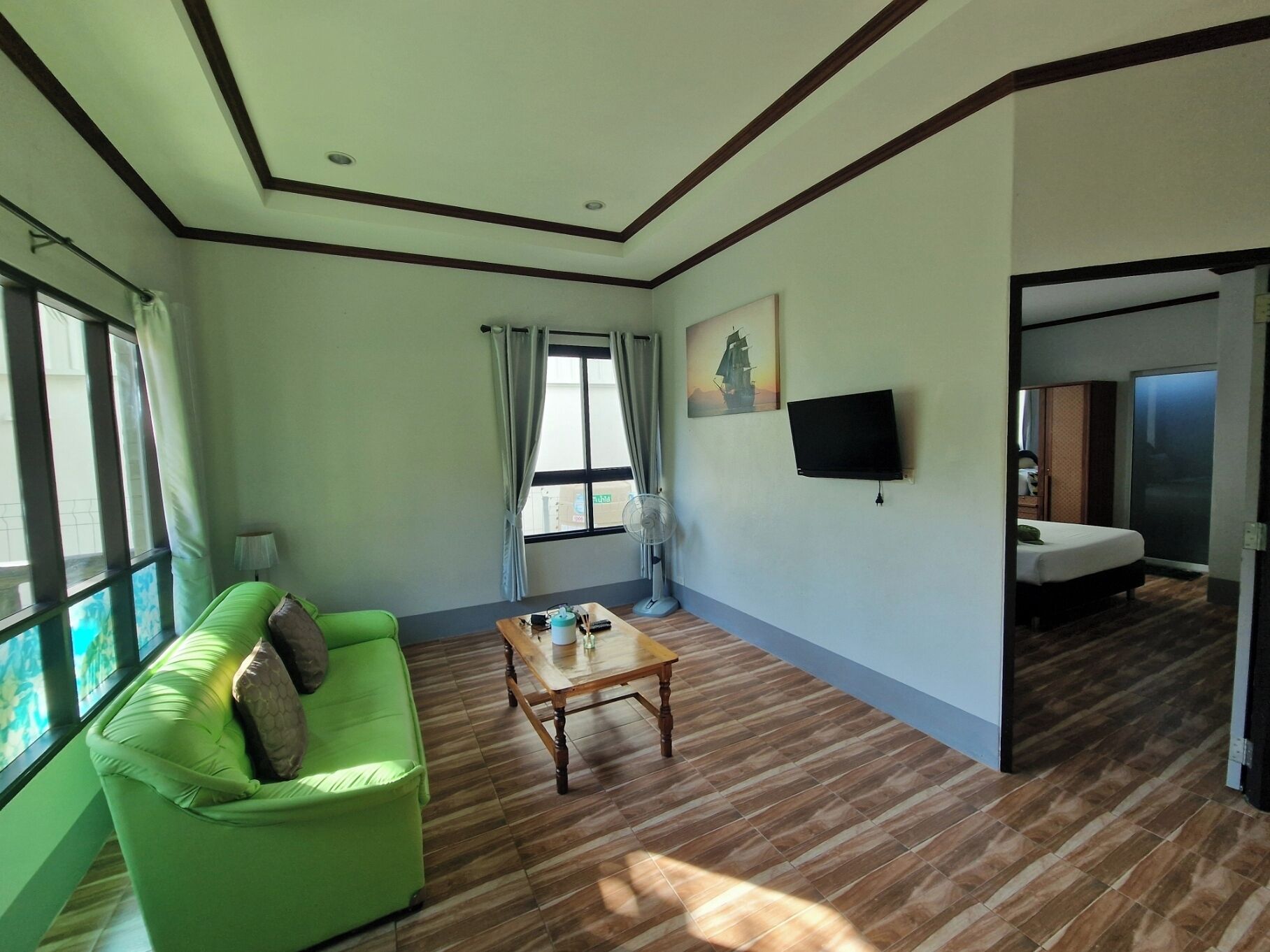 Apartament Deluxe | Sala d'estar | Televisor 