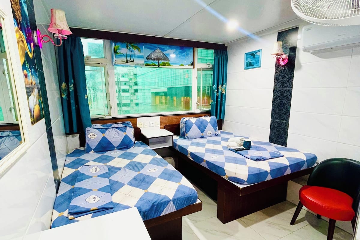 Habitación triple Deluxe, 2 habitaciones | Sistema de insonorización, wifi gratis, ropa de cama