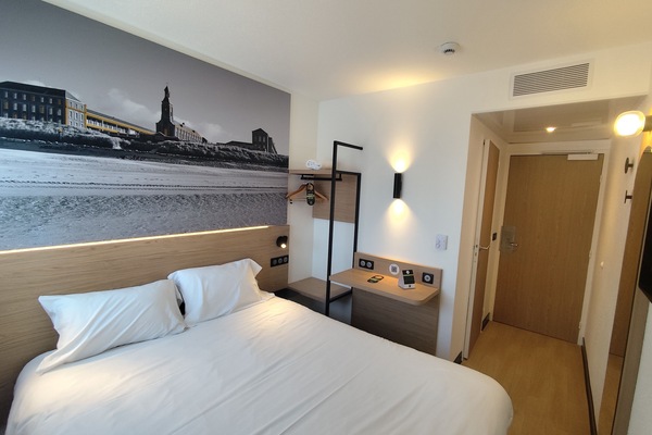 Desk, blackout drapes, WiFi (free), bed sheets