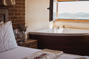 Quarto superluxo | Frigobar, Wi-Fi de cortesia, roupa de cama