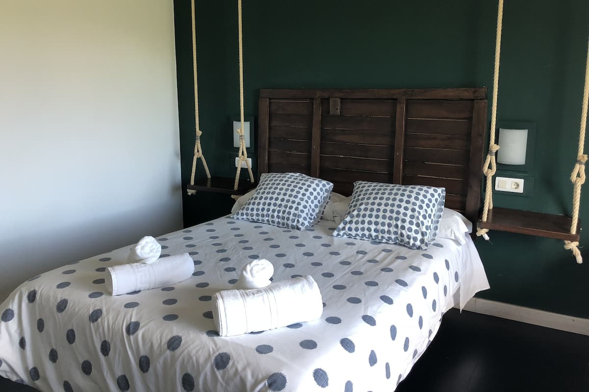 Deluxe Double Room, Mountain View | Desk, cribs/infant beds, free WiFi