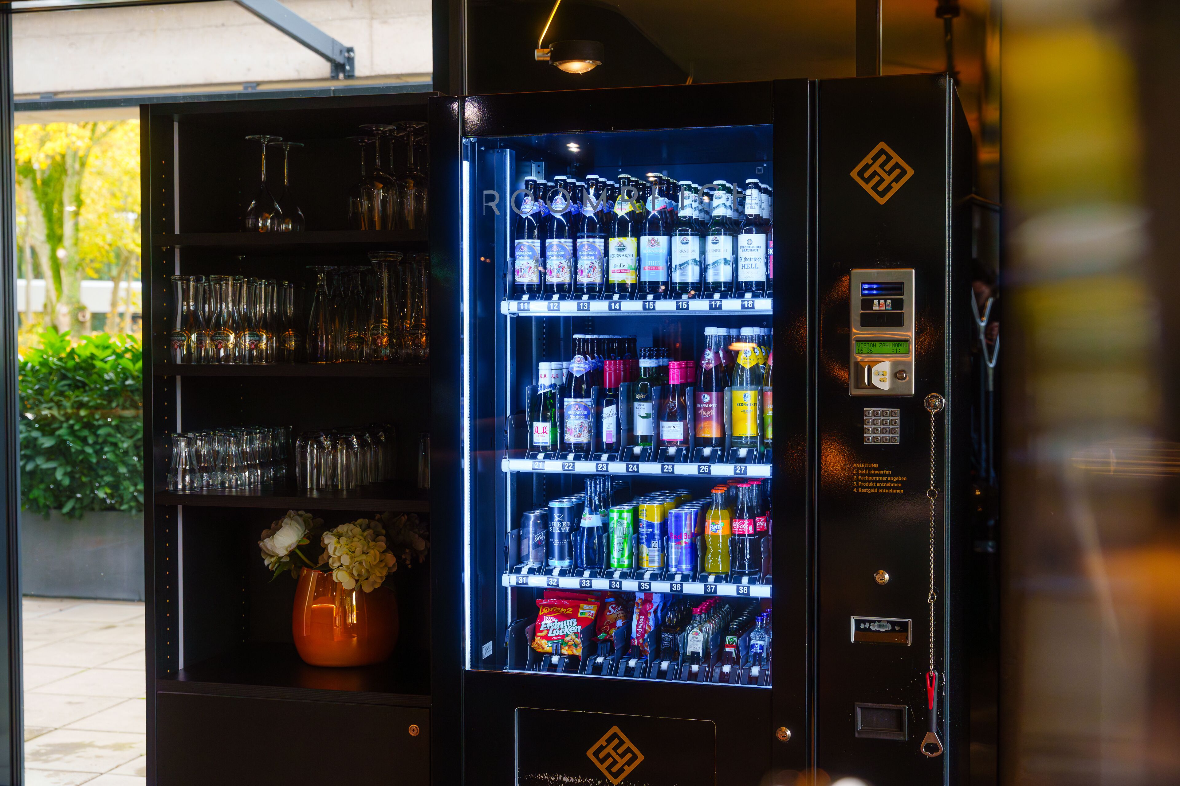 A vending machine with various beverages and snacks.