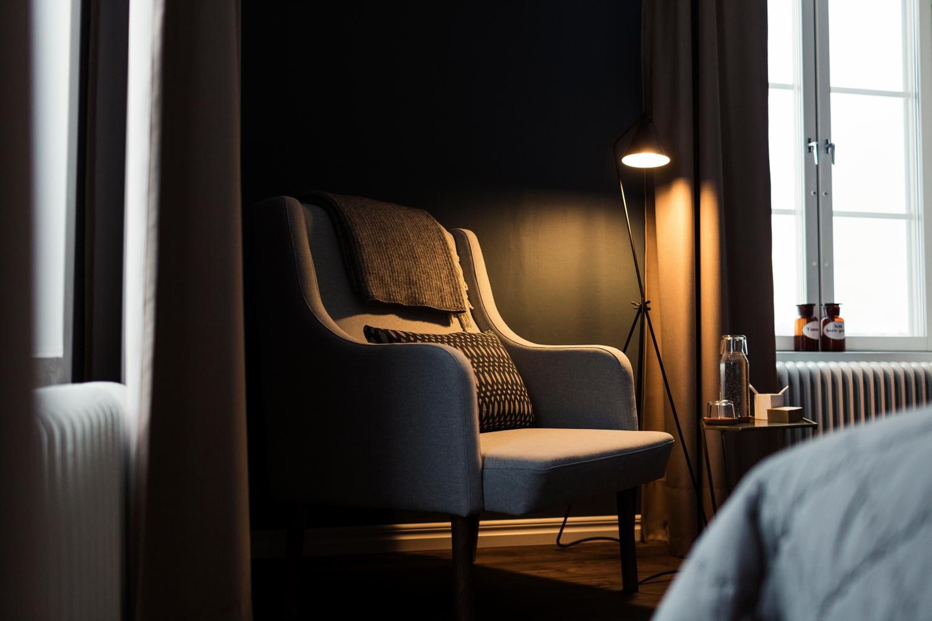 premium bedding, blackout curtains, soundproofing, iron/ironing board