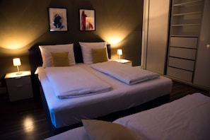 Apartamento, 1 quarto | Área de estar | TV de tela plana