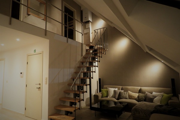 Deluxe Duplex, 2 Bedrooms (Third Floor) | Living area | 55-inch flat-screen TV with cable channels, TV