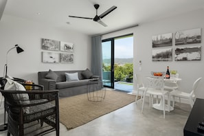 Luxury Apartment, 2 Bedrooms, Balcony, Partial Ocean View (Moremi) | In-room safe, desk, iron/ironing board, free WiFi - Sunset Splendour Guesthouse (Cape Town)