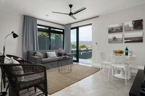 Luxury Apartment, 2 Bedrooms, Balcony, Partial Ocean View (Chobe) | In-room safe, desk, iron/ironing board, free WiFi - Sunset Splendour Guesthouse (Cape Town)