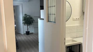 2 bedrooms, desk, blackout curtains, iron/ironing board