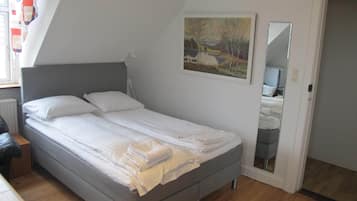 Family Quadruple Room, 1 Bedroom | Individually decorated, desk, soundproofing, iron/ironing board