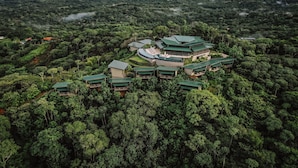 A resort with multiple buildings surrounded by dense forest. - Hotel Three Sixty - Adults Only (Ciudad Cortés)