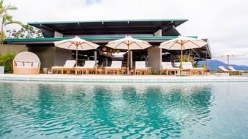 Outdoor pool, open 7:00 AM to 7:00 PM, pool umbrellas, sun loungers