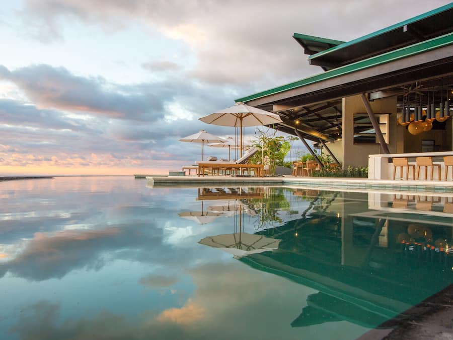 Outdoor pool, open 7:00 AM to 7:00 PM, pool umbrellas, sun loungers