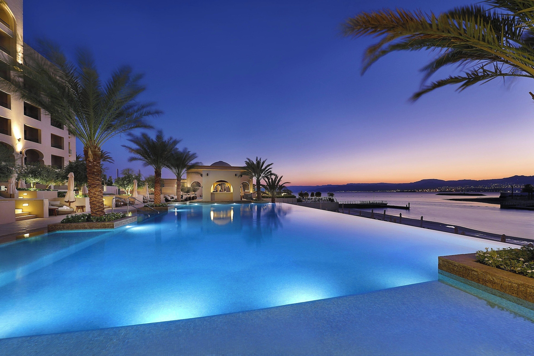 2 outdoor pools, open 9:00 AM to 6:30 PM, pool umbrellas, sun loungers