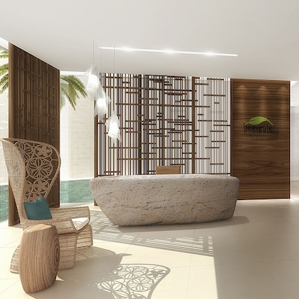 A modern spa interior with a reception desk, seating area, and a decorative wall with a logo.