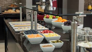 Daily buffet breakfast (USD 18 per person)