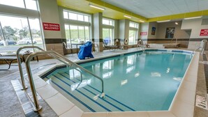 An indoor swimming pool with no diving allowed, tiled floor, and sunlit windows. - Drury Inn & Suites Pittsburgh Airport Settlers Ridge (Pittsburgh)