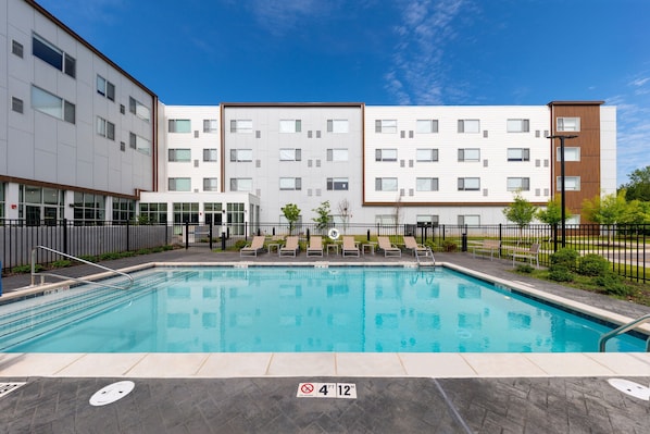 Seasonal outdoor pool, pool loungers