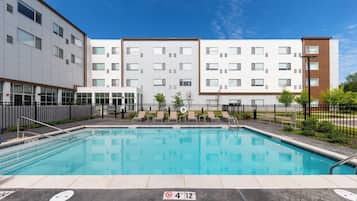 Seasonal outdoor pool, pool loungers