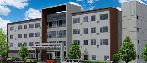 A modern building with a prominent 'element' sign, multiple windows, and a covered entrance.