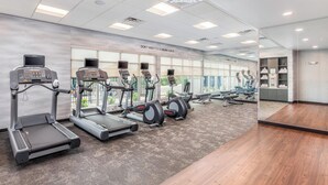 A gym with treadmills, elliptical machines, and a mirrored wall. - Fairfield Inn & Suites by Marriott Lebanon (Lebanon)