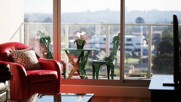 Apartment, 2 Bedrooms | Living area | Flat-screen TV, DVD player