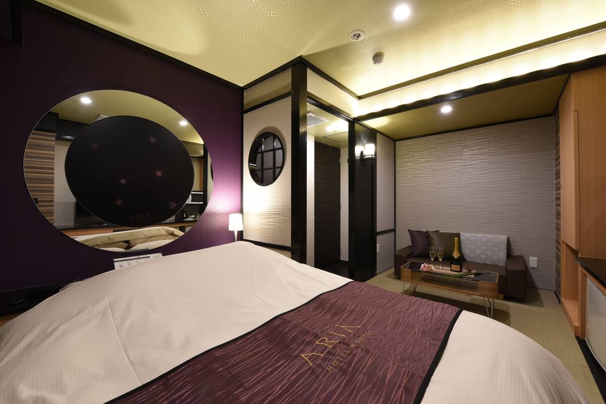 Economy Double Room | Living area | Flat-screen TV