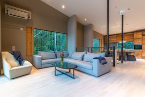 House, 4 Bedrooms | Living area | Flat-screen TV, pay films
